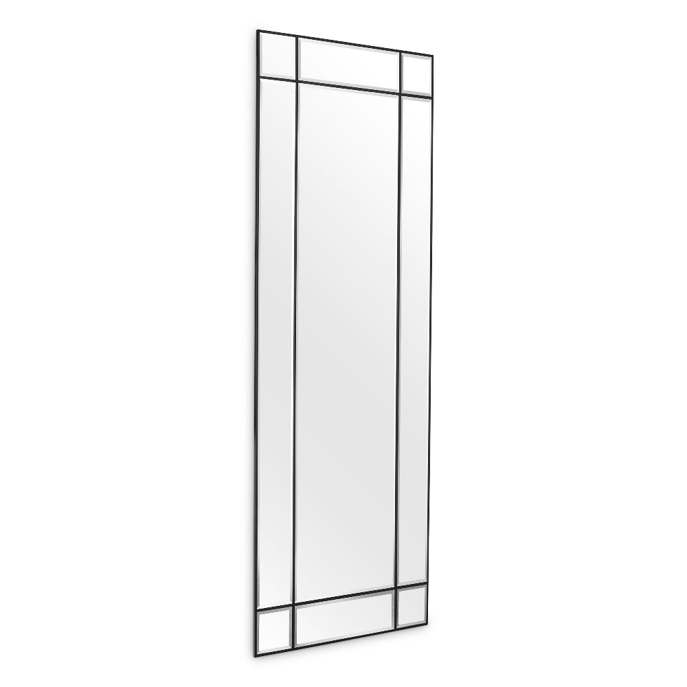 Tall, thin mirror with black frame on a white background