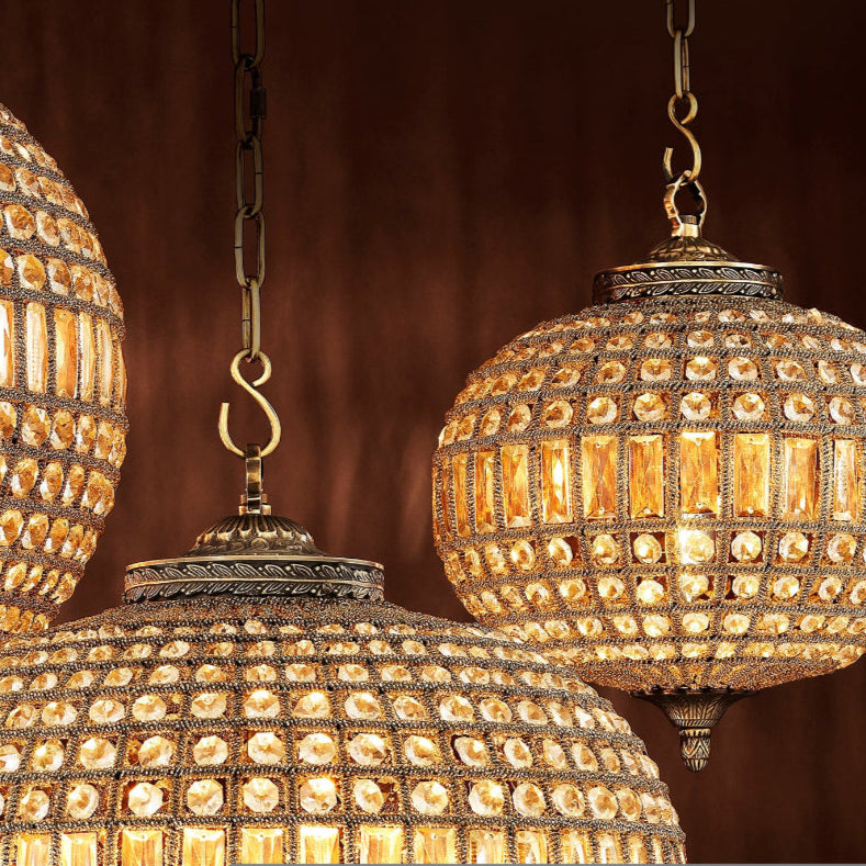 Decorative hanging lights with intricate designs on a brown background