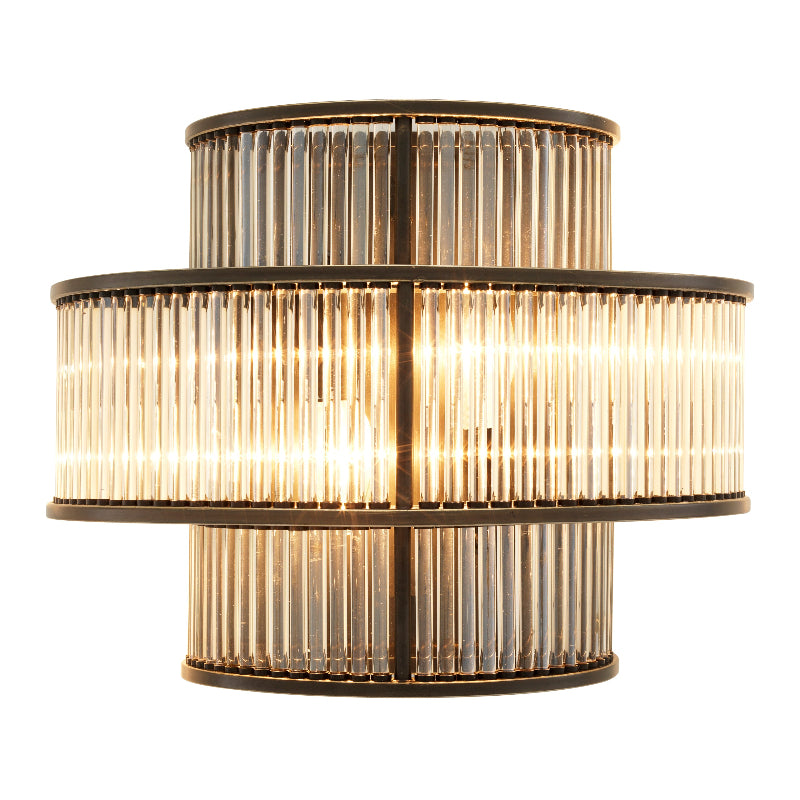 A wall lamp with a nickel finish featuring clear glass rods arranged in a vertical pattern, creating a glamourous and sophisticated look.