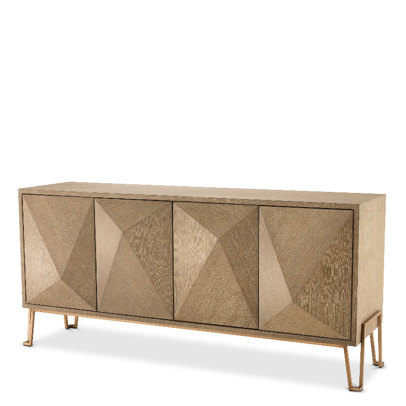 A modern dresser with a geometric pattern on the doors, a brushed brass finished frame, and washed oak veneer in a Highland style.