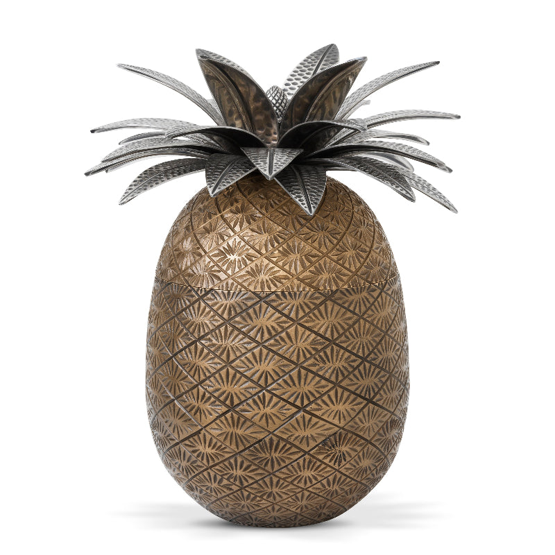 A decorative pineapple-shaped box with an engraved brass body and an antique silver finish.